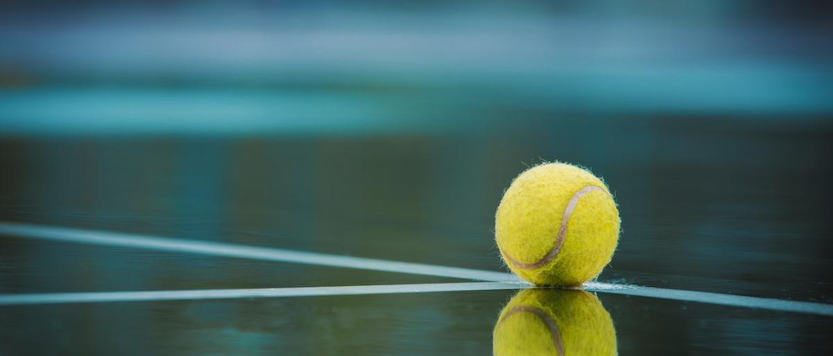 Tennis ball on tennis court