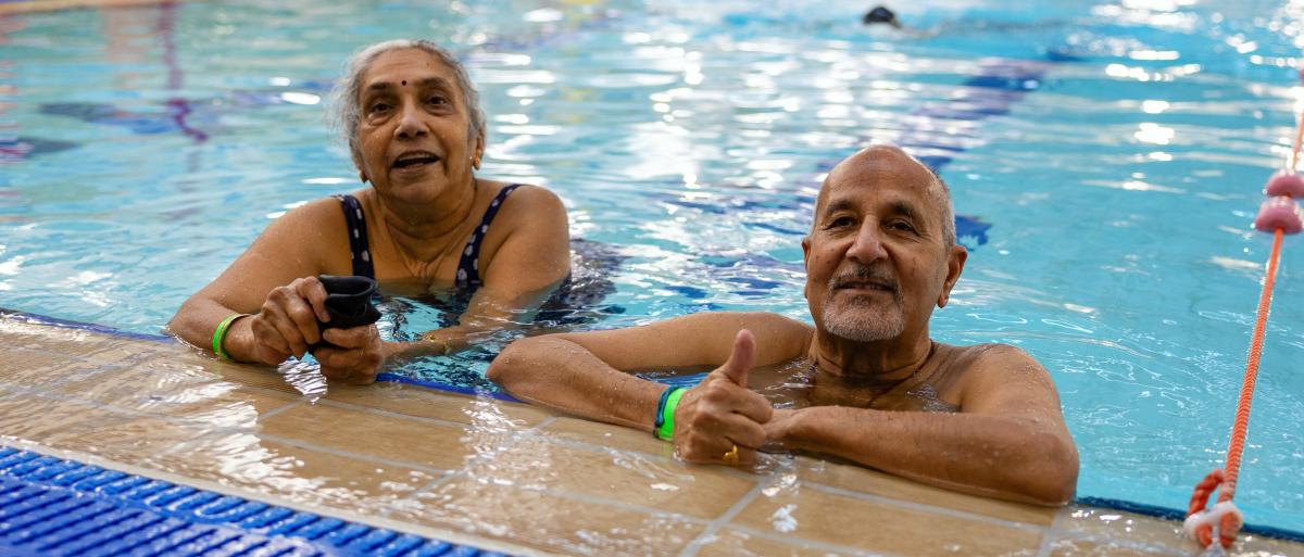 A man and woman in the pool