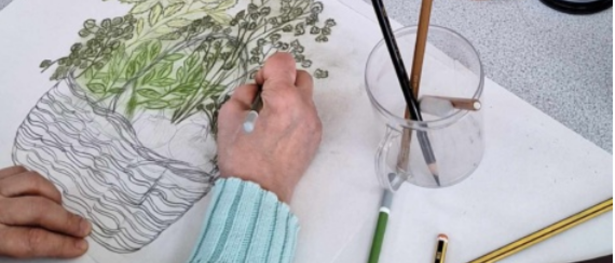 Someone drawing a flower basket