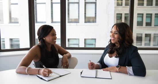 Two women chatting