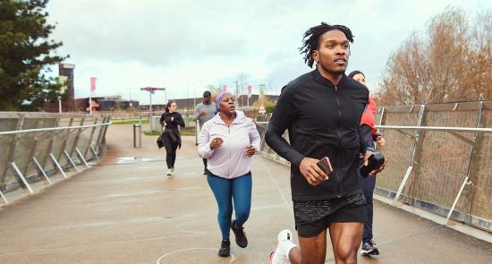 A group of people jogging 